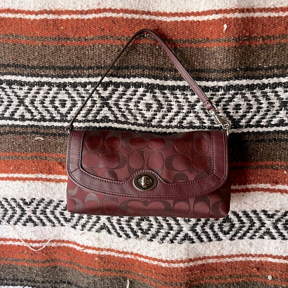Small burgundy Coach bag
